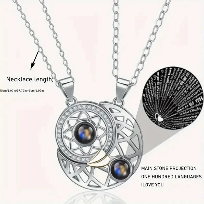Silver necklace with gemstones and an enlarged view of the pendants inside on a white background